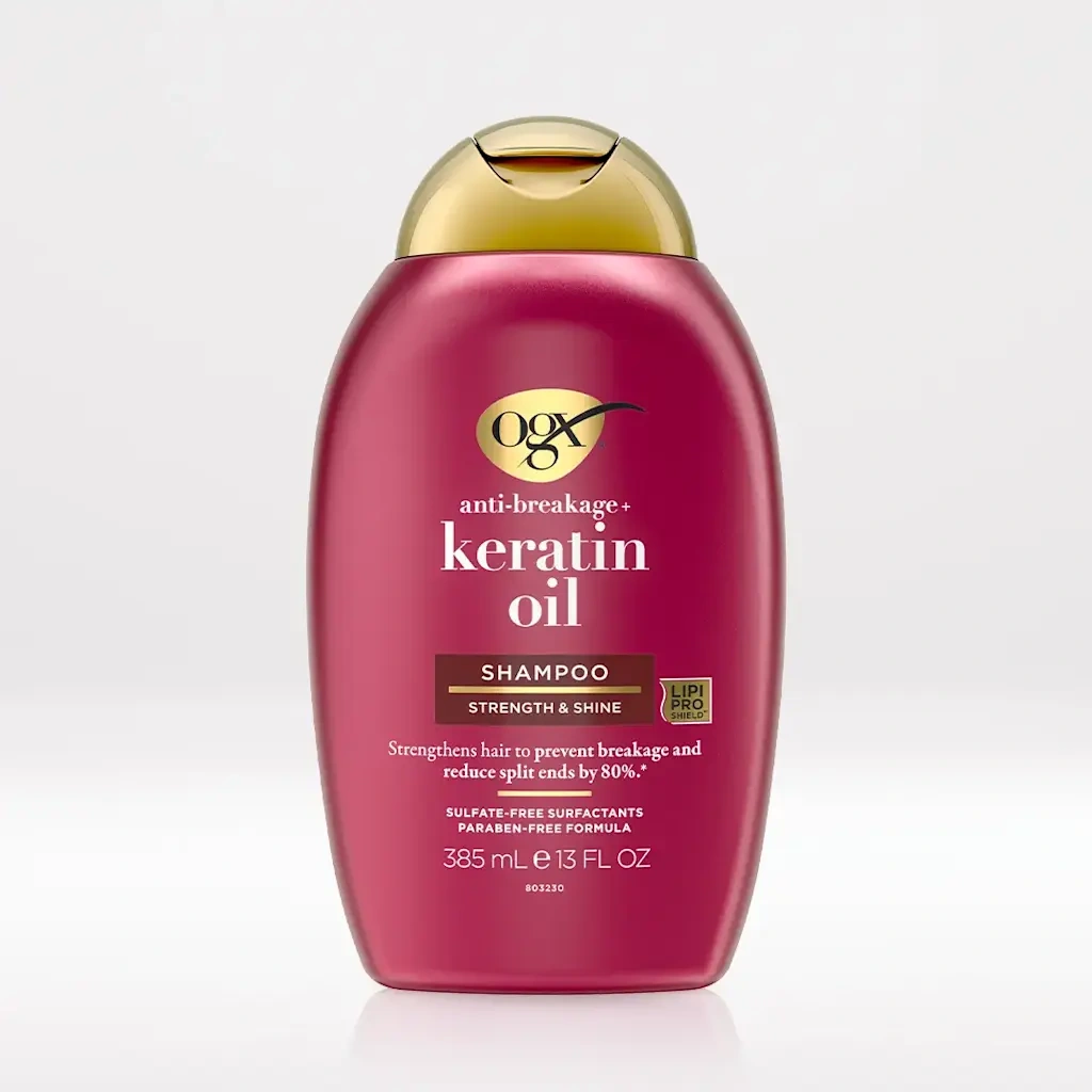 OGX Anti-Breakage + Keratin Oil Shampoo – شامپو ترمیم‌کننده و ضد موخوره با روغن کراتین برای موهای آس